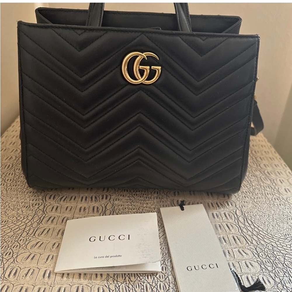 Pre-loved authentic Gucci bag with satchel.